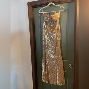 Floor length strapless gold sequined dress
